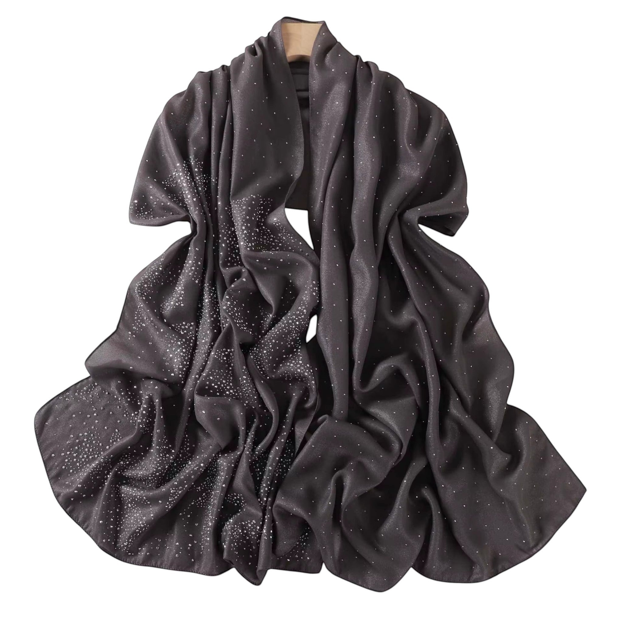 MiRA grå sjal i polyester med diskreta glitterdetaljer, draperad för en elegant och mångsidig look.