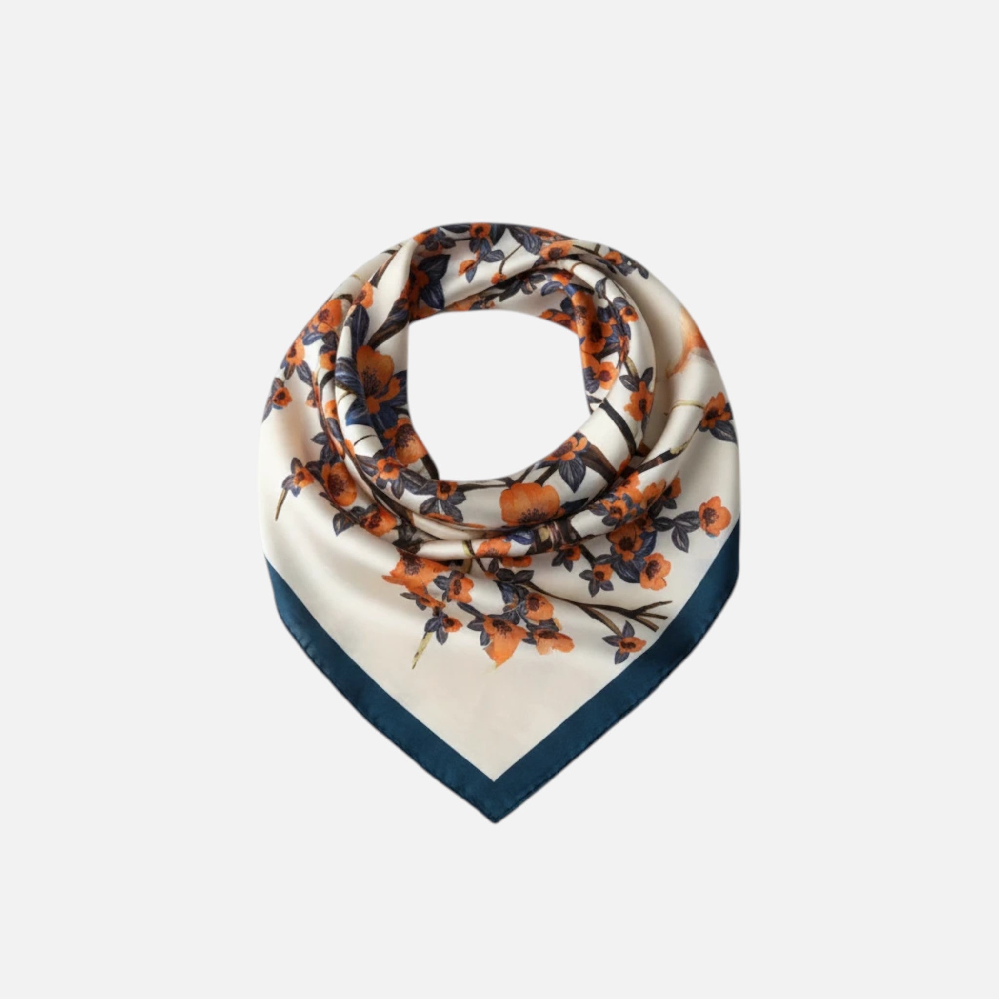 MiRA mönstrad scarf i polyester med blommigt motiv i orange och vitt på ljus botten med mörkblå kant.