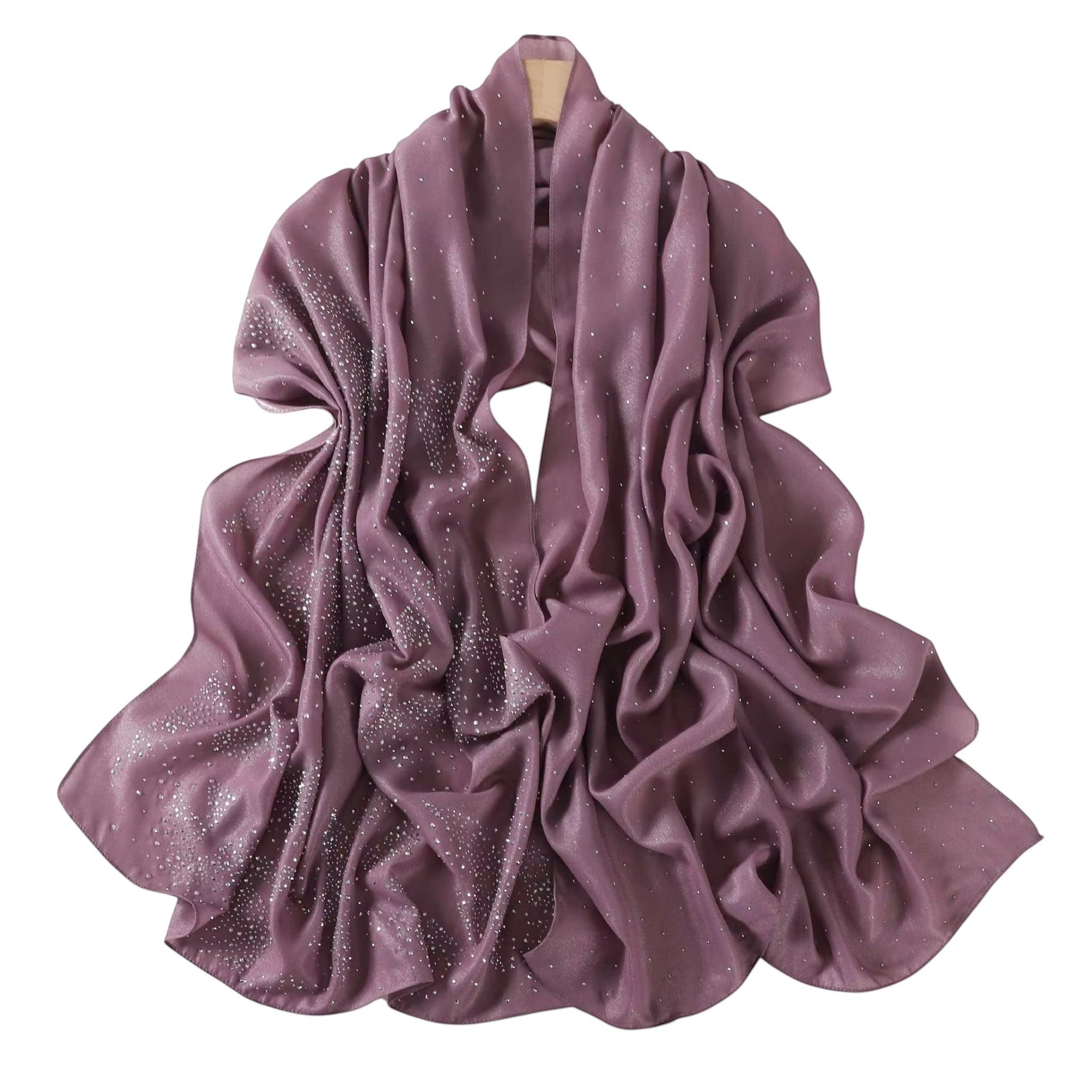 MiRA sjal i rose champagne med skimrande glitterdetaljer i mjuk polyester, perfekt för festliga tillfällen.