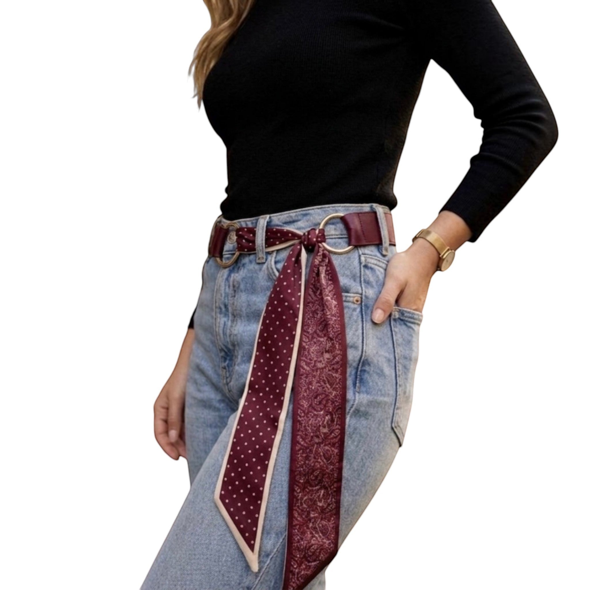 MiRA vinrött scarf-bälte i veganskt läder med mönstrad scarfdetalj och silverfärgat runt spänne på jeans.